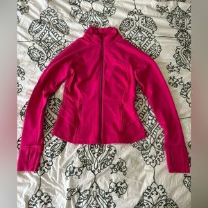 Size 4 lululemon pink jacket with peplum back.